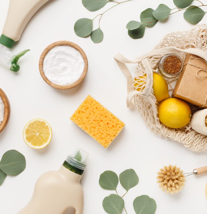 Eco friendly natural cleaners, cleaning products, chemical detergent bottles, flat lay on white background